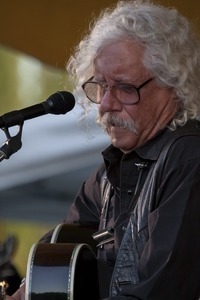 Arlo Guthrie performing at the Clearwater Festival