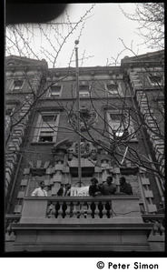 Umoja (Black student union) activists look out from balcony of occupied administration building, Boston University