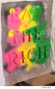 Occupy Wall Street: stencil reading, 'eat the rich'