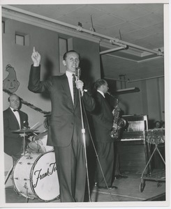 Unidentified man speaking at Halloween party