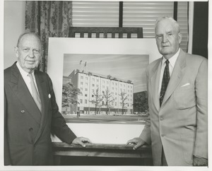 Jeremiah Milbank Sr. and Bruce Barton posing with an illustration of prospective building plans