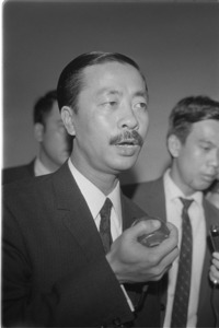 Nguyen Cao Ky addressing the press upon his arrival to Saigon returning from Paris.