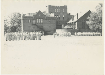 Army Air Corps Trainees marching behind Judd Gymnasium (May 1943)