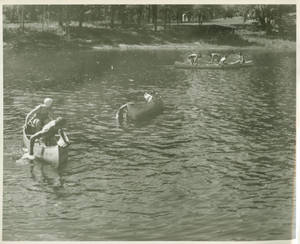 Camper's tipping canoes on Lake Massasoit (1953)