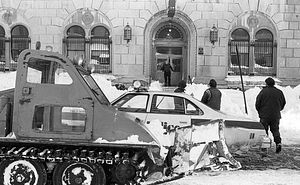 Plow and unidentified pedestrians in front of Boston Police Headquarters on Berkeley Street