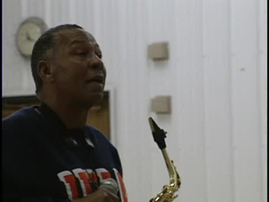 ¡Colores!; Interview with Lloyd Kiva New, Saxophone Presentation, and a Student Painting