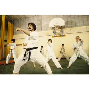 Group of students practicing martial arts