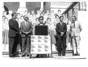 John Joseph Moakley, Fawn Evenson and others on the Capitol steps at a Support of the Textile Act Support Rally, 1980s