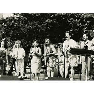 Group of singers performing on Festival Betances' outdoor stage.
