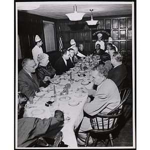 Members of the Tom Pappas Chefs' Club serve a group of diners in Bunker Hill
