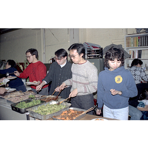 Guests and food at Chinese Progressive Association anniversary event