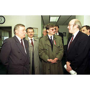Lech Walesa and Dean Robert Lowndes converse at the inauguration of the International Degree Program