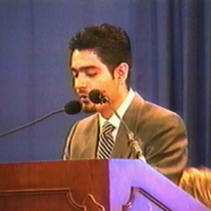 A young man speaking at the dedication of the Curry Student Center