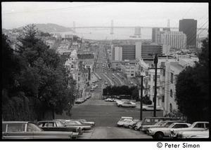 View of Bay Bridge down steep San Francisco street