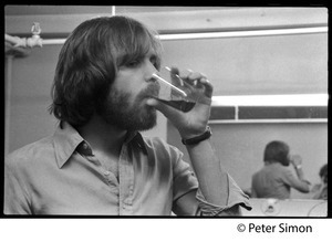 Bob Weir taking a drink from a cup