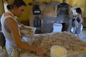 Hungry Ghost Bread: owner and baker Jonathan C. Stevens working on cinnamon rolls