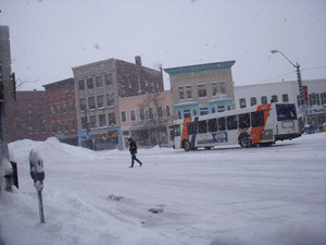 Pedestrian crossing Main Street near Crafts Ave., Northampton, Mass., in heavy snow