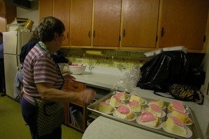 Church supper at the First Congregational Church, Whately: cooks in the kitchen preparing dessert