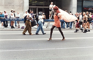 A Photograph of Cocoa Rodriguez Walking in the 1995 Pride Parade