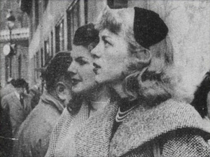 Roberta Cowell Standing in Crowd