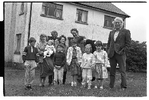 Seamus Heaney with his two brothers, wife and children at Bellaghy