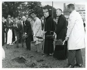 McElroy Commons exterior: groundbreaking with John E. Murphy, Richard Cushing, and Michael P. Walsh