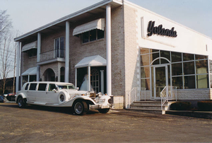 Excalibur limousine in front of salon