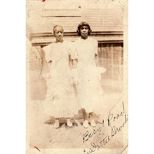 Beryl Road and Dottie Brook in their graduation outfits