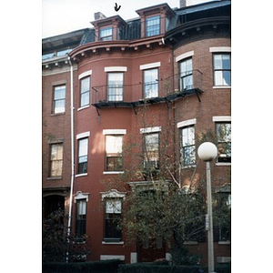 Painted brick row house at 154 West Concord Street, Boston.