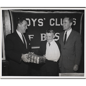 John Foley receives the Jerry McKenna Award from Joseph D. Ward, Secretary of State, while Gerald W. Blakeley, Jr. looks on at the 19th Annual Awards Night
