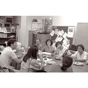 Association members, including Suzanne Lee, at a meeting