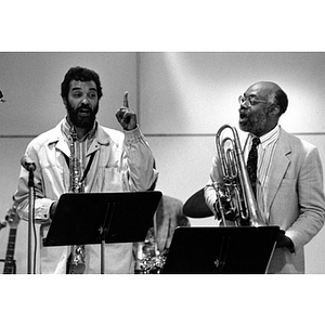 Leonard Brown, left, and Bill Lowe, right, performing at the John Coltrane Memorial Concert