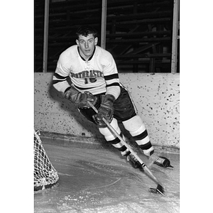 Hockey player, Jim Leu, skates toward the camera