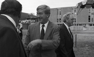 Ceremonial groundbreaking for the Conte Center: unidentified man chatting with Gov. William Weld, Richard O'Brien in background