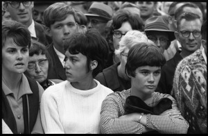Onlookers at the Turkey Day parade, watching Robert F. Kennedy stumping for Democratic candidates in the northern Midwest