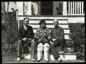 Donald Baxter MacMillan (far left), arctic explorer, with unidentified man and woman