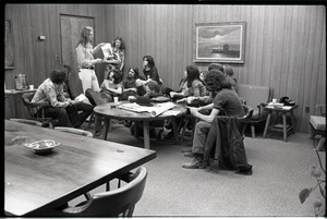 Jim Baker (with magazine) talking to Free Spirit Press crew