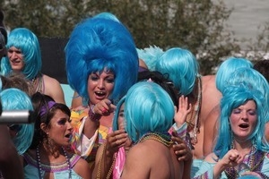 Parade marchers with great blue wigs : Provincetown Carnival parade