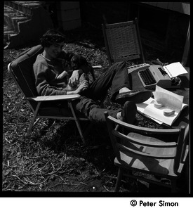 60 Chestnut Street: Stephen Davis seated in a lawn chair with puppy and typewriter
