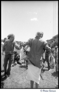 Peter Simon (left) and Bhagavan Das dancing energetically at Sonoma State University