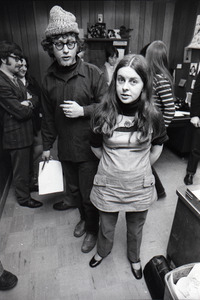 Bernadette Devlin McAliskey standing in the WBCN office with Danny Schechter