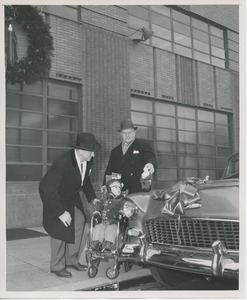 Patient Michael Kaplan with new company car at Christmas