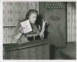 Mrs. William S. Kilbourne speaking at Christmas party