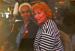 A Photograph of Marlow Monique Dickson Sitting with a Friend