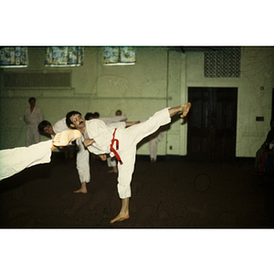 Men practicing martial arts