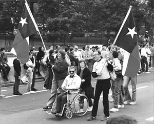Phyllis Frye Carries the Texas Flag In the 1986 March on Washington for Lesbian and Gay Rights