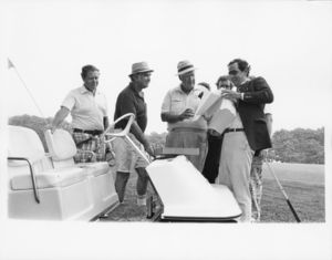 Speaker Tip O'Neill preparing to sign the Tax Bill at Eastward Ho Golf Course, 1980s