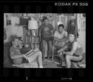 Photographs of students in dorm room, 1985 July