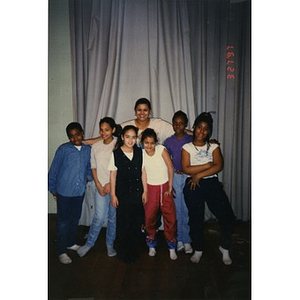 Six children posing with their dance instructor.