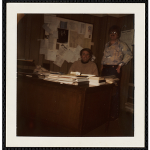 Two South Boston Boys' Club staffers posing together at the office